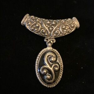 Elegant Silver tone Pendant with Intricate Design